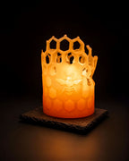 'Honey Bee' beeswax honeycomb pillar candle, lit