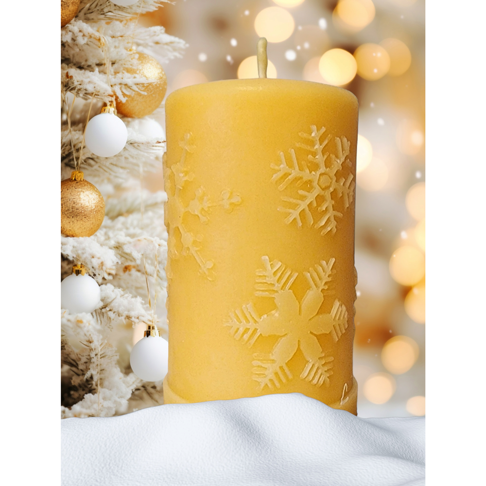 'First Snowfall' natural beeswax snowflake pillar candle, detail view