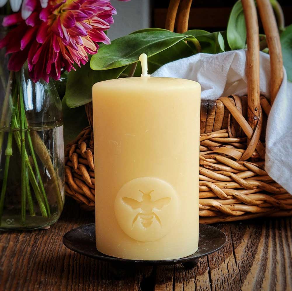 'Big Moon Bee' 100% pure beeswax pillar candle with a single bee design, 2.5 x 4 inches, from Big Moon Beeswax