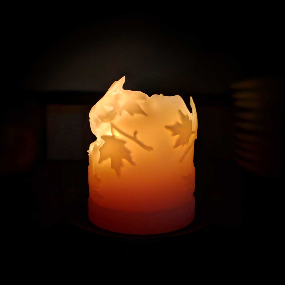 Beeswax Pillar Candle with fall leaves design. 