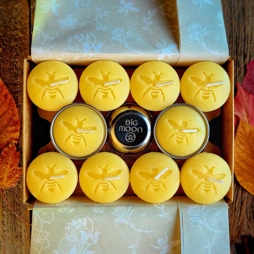 Moon Drops refillable beeswax tea lights in stainless steel cups