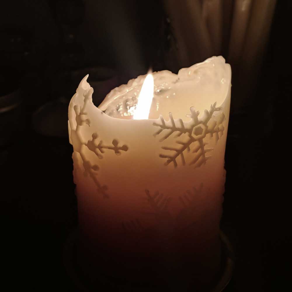 beeswax candle with snowflakes