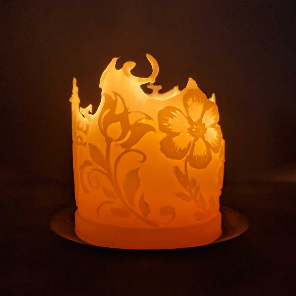 'Into the Garden!' beeswax pillar candle, detail of the flower design