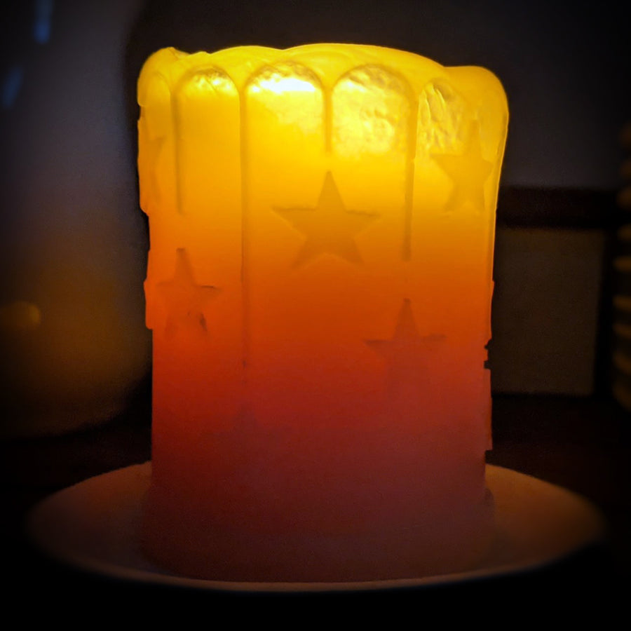 Beeswax candle pillar with stars